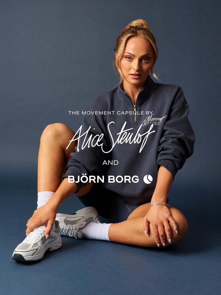 Woman in athletic wear sits on the floor against a dark background. Text reads "The Movement Capsule by Alice Stenlöf and Björn Borg."